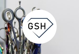 Groomer Supply House logo – Groom Curriculum preferred vendor for grooming tools and shears