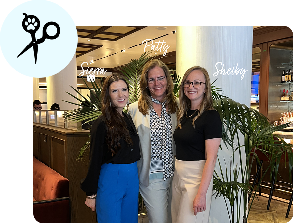 Groom Curriculum co-founders Sierra Elbert, Patty Pierce, and Shelby Mitchell at a professional event celebrating the success of the program